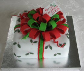 christmas present parcel cake bows and ribbons