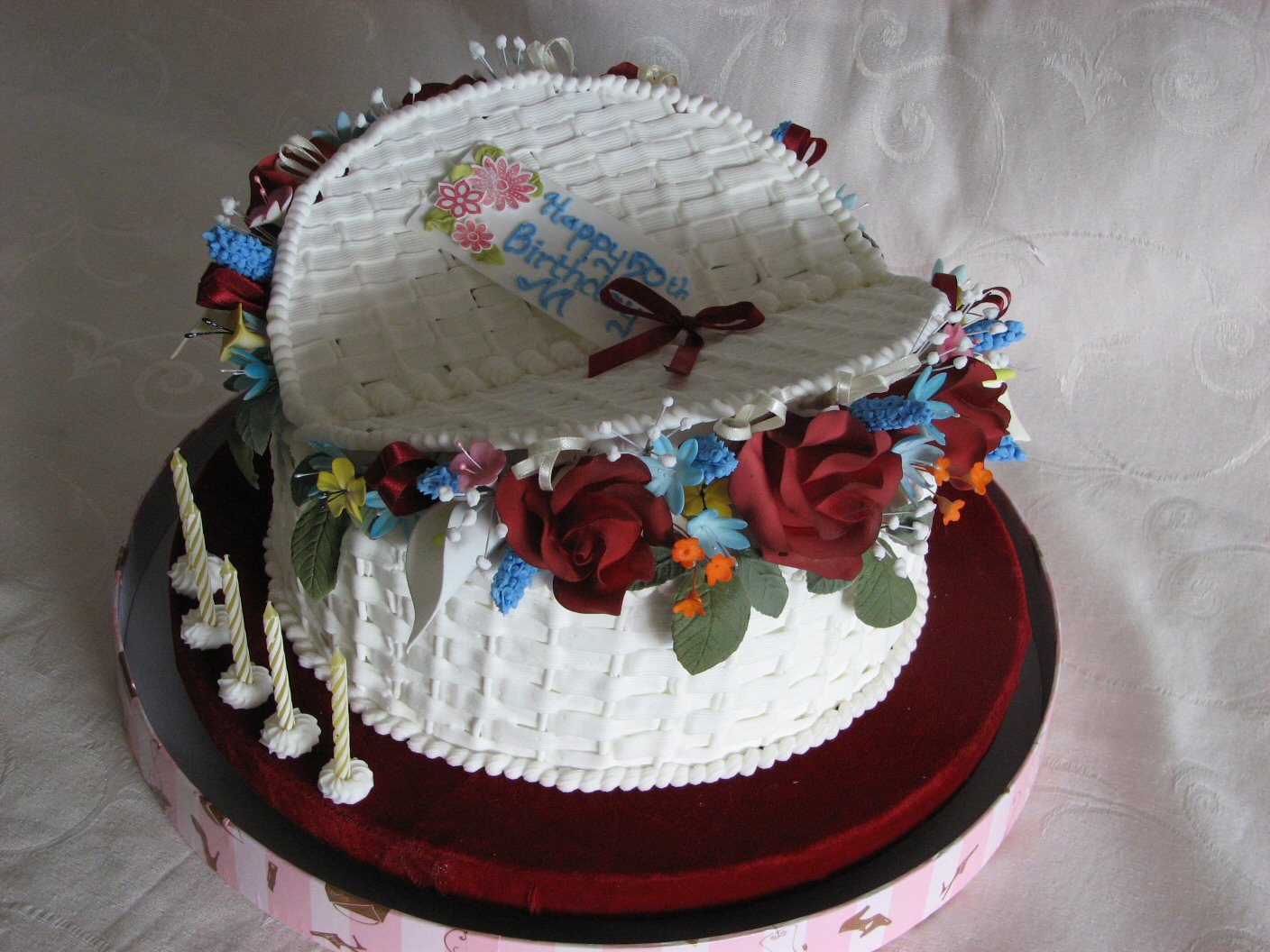sugar basket of red roses and other flowers